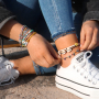 Realizza cavigliere, bracciali e collane con perline katsuki, conchiglie cipree, coda di topo e catena a rol&ograve;. 