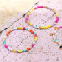Lasciati ispirare da questi gioielli allegri e coloratissimi in stile wanderlust 
