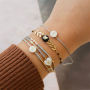 Idee creative per bracciali con perline di vetro a rondella