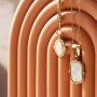 Idee creative con ciondoli in acciaio inossidabile e conchiglie per creare gioielli