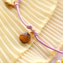 Disegna collane alla moda con ciondoli in pietra naturale