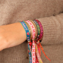 Crea braccialetti e regali festivi con il nastro BY31&reg; e campanellini